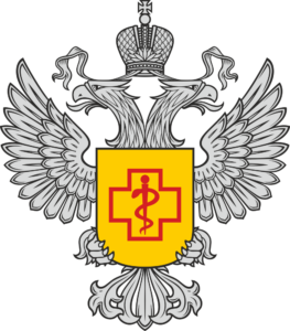 Emblema de Rospotrebnadzor con águila bicéfala plateada, escudo dorado y cruz roja en PNG transparente