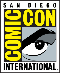 Logo Comic-Con International — emblème vertical jaune et noir avec un œil et la mention San Diego — PNG